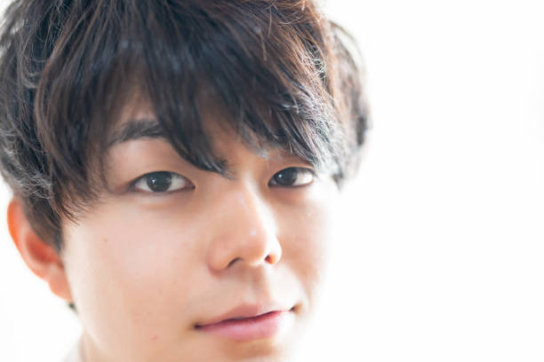 Close up headshot of a 20 years old Japanese male