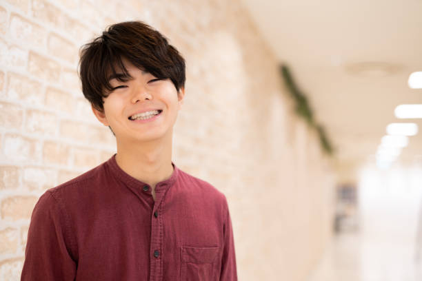 Portrait of a young Asian man, smiling stock photo
