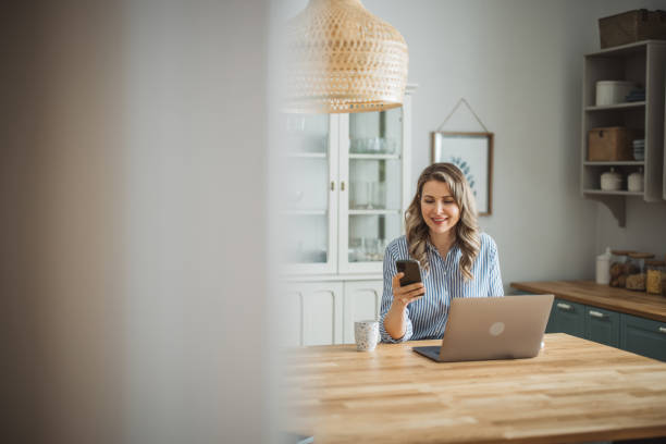 istock Woman working at home 1383498253