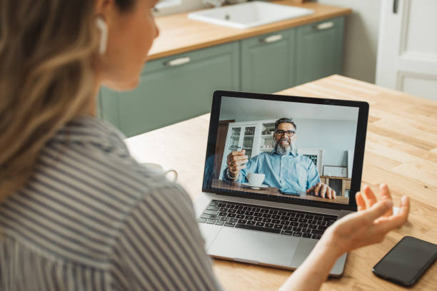 istock Woman working at home 1383498769
