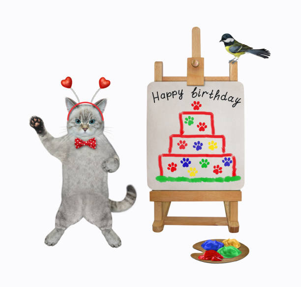 istock Cat ashen artist painted birthday cake 1383499079