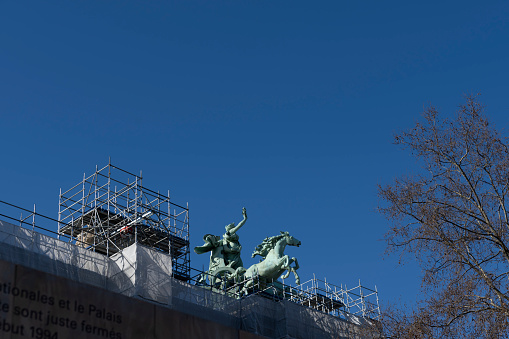 The roof of the Reunion des Musees Nationaux with scaffolding during renovation and cleaning in Paris, France, Europe.