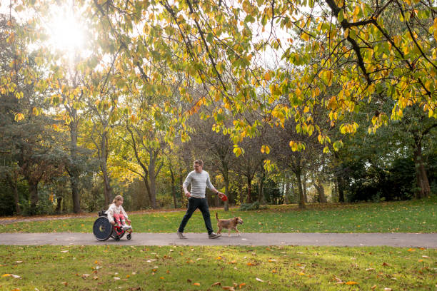 istock Park Dog Walking With My Dad 1383501434