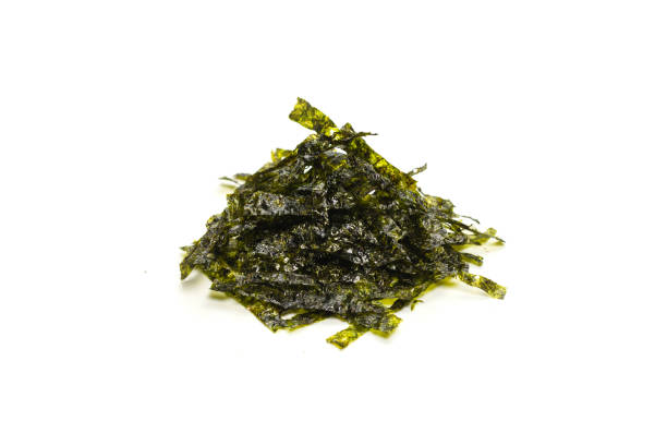 istock Tasty nori seaweed isolated on white background. 1383510317