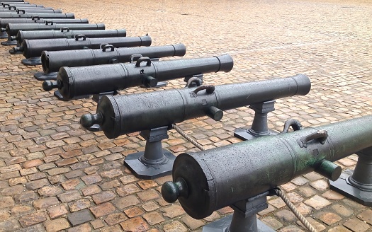 French cannon lines up in a courtyard in Paris