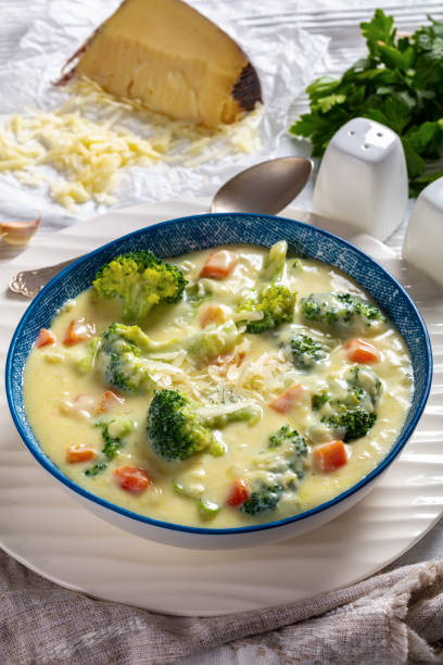 istock Broccoli cheese soup in a bowl, top view 1383515229