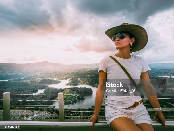 Latin Woman With Hat And Sunglasses Stock Photo - Download Image Now - Medellin - Colombia, Adult, Adults Only