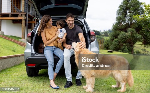 istock Happy family going on a road trip 1383516987