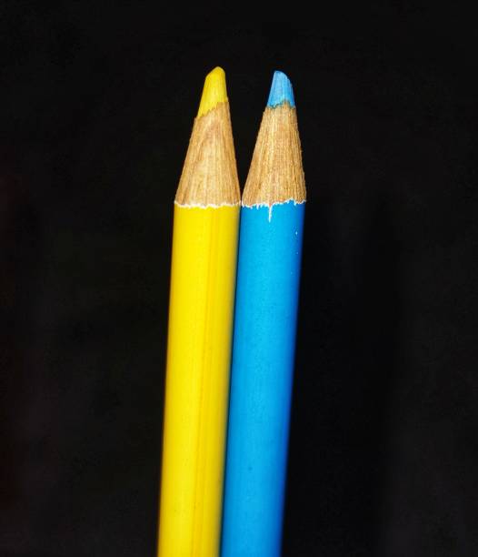 istock Yellow and Blue Colored Pencils 1383517740