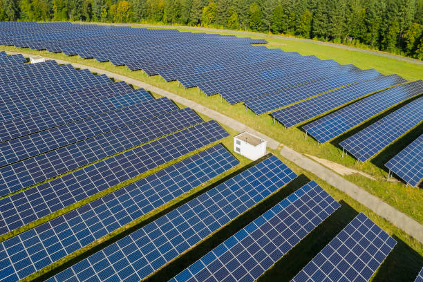 istock Rows of Blue Solar Panels, Aerial View 1383518711