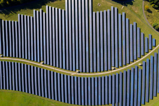 istock Rows of Blue Solar Panels, Aerial View 1383519365