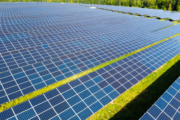 istock Rows of Blue Solar Panels, Aerial View 1383521351