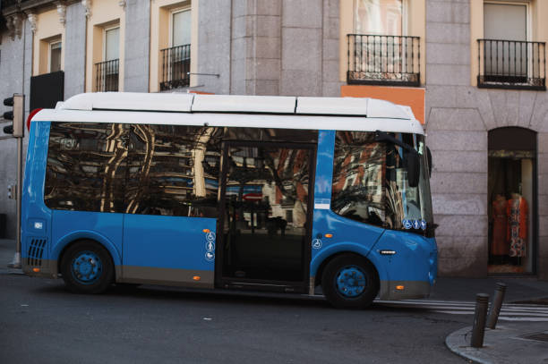 istock Small city bus in motion 1383523260