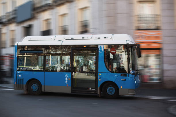 istock Small city bus in motion 1383523338
