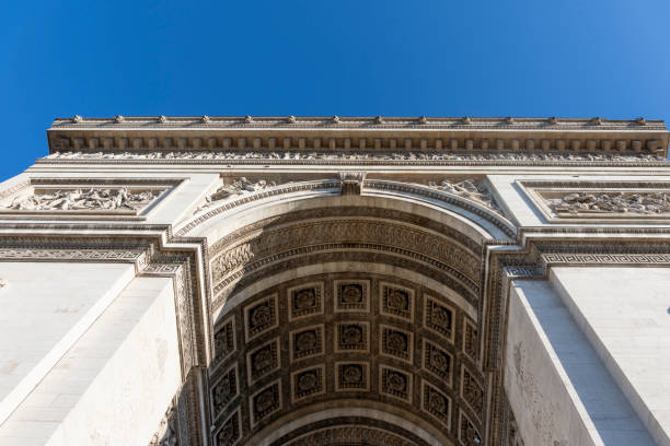 Arc de Triomphe in late afternoon sun in Paris, France, Europe.