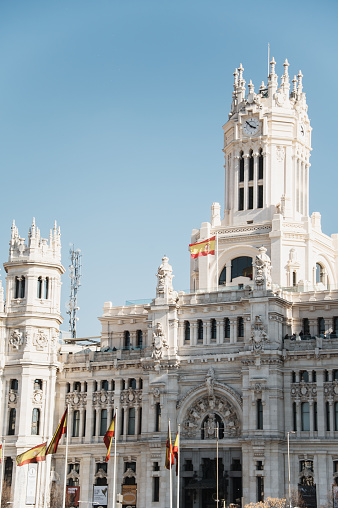 Madrid, Spain - October 29, 2022: Puerta del Sol buildings and statue on a sunny day.