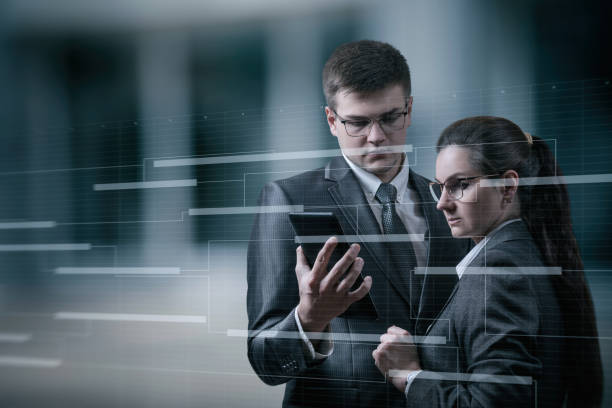 istock Businessmen are planning but virtual computer screen and phone. 1383525288