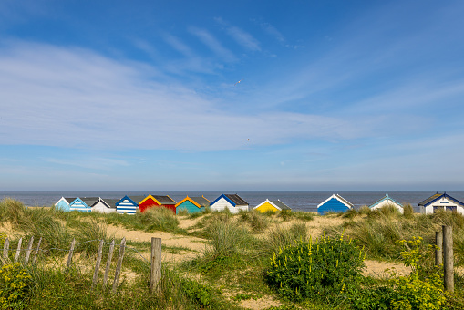 Colourful Beach Huts on Southwold Beach Suffolk