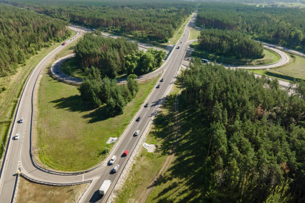 istock Road junction intersection with car traffic transportation 1383527651