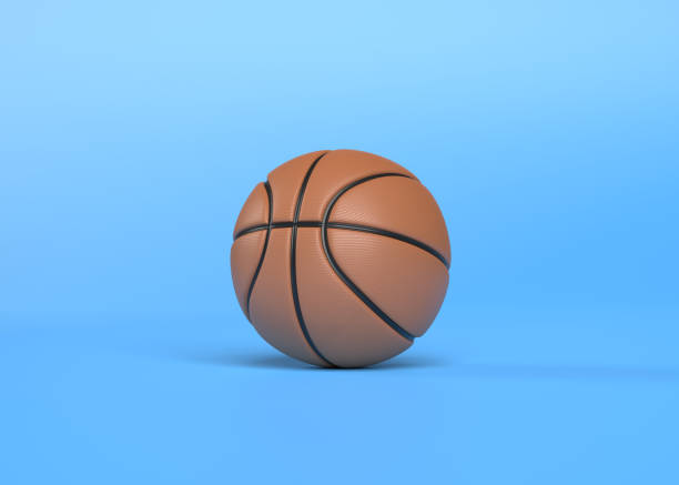 istock Orange basketball on a bright blue background with copy space 1383531083