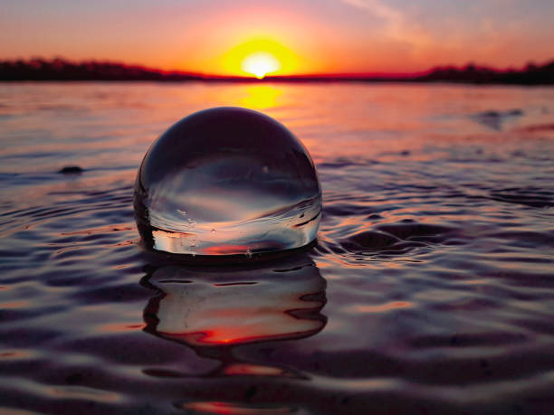 beautiful sunset reflection - long bay imagens e fotografias de stock