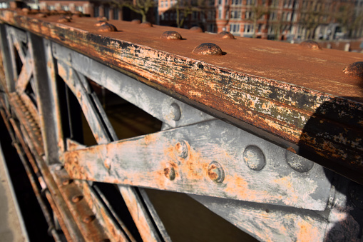 Detail of weathered, metal bolted bridge in Speicherstadt / Hafencity, Hamburg, Germany