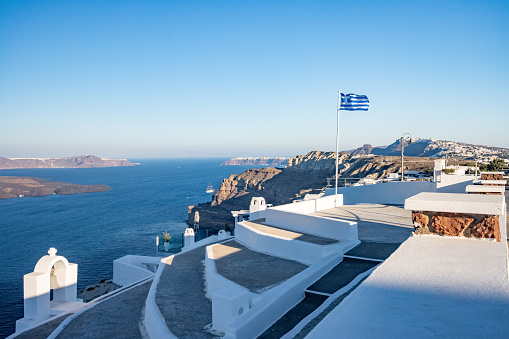 Greek Flag on Santorini Caldera in South Aegean Islands, Greece