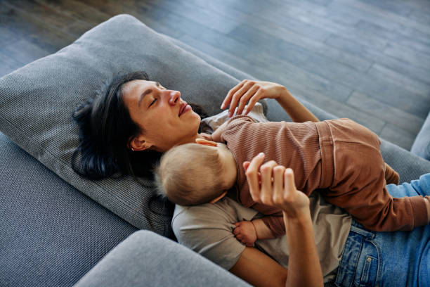 istock Mother and baby at home 1383535731
