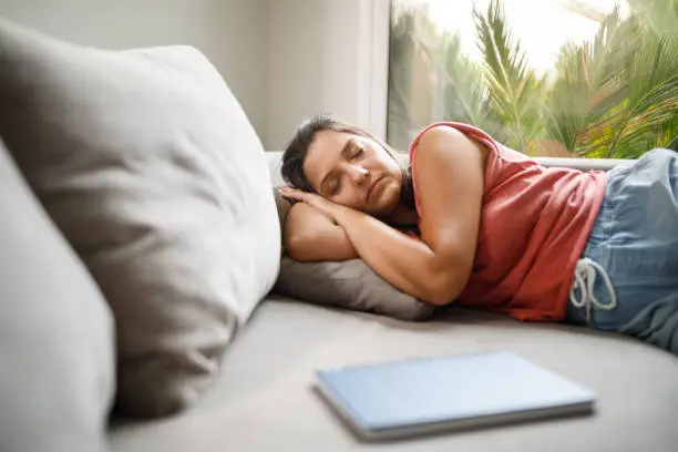 Photo of Woman taking a nap at home