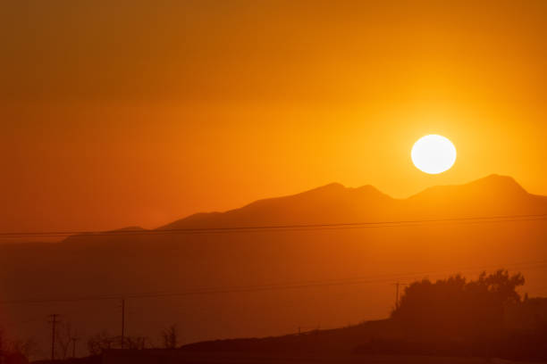 istock Sunset over Pyrgos Kallistis on Santorini, Greece 1383539724