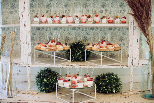 istock Vintage delicious and tasty dessert table with cupcakes 1383545096