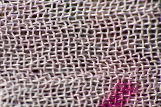 Ultra macro backgrounds of natural and artificial fabric for textile and clothing design. Microstructure of the material