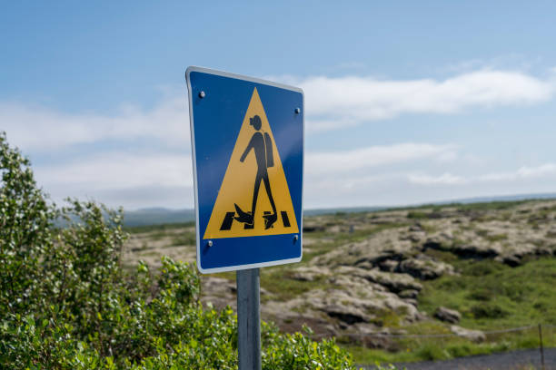 Caution - traffic sign at Thingvellir National Park Snorkeling area at Silfra