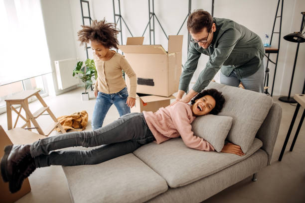 istock Family moving into a new apartment 1383548055