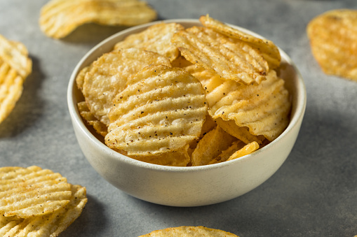 Salt and Pepper Crinkle Potato Chips in a Bowl
