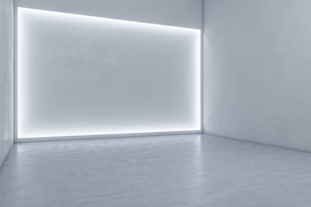 istock Bright exhibition hall interior with illuminated white mock up wall and concrete floor. 3D Rendering. 1383549343