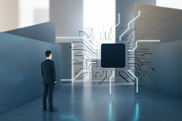istock Attractive european businessman standing in concrete interior with abstract micro chip and mock up place. AI and technology concept. 1383556511