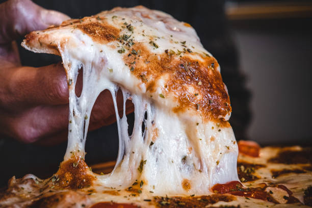 Slice of cheese margherita pizza