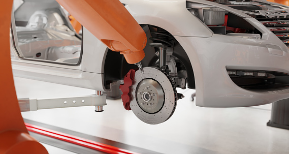 3d render of a robot arm assembling a brake disc on car over conveyor on the automobile production line. 3d rendering of robot assembly line in car factory.