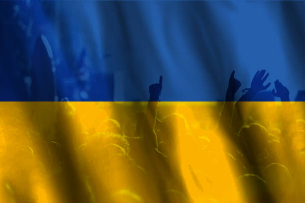 stand with Ukraine hands and Ukraine flag concept of solidarity with the citizens of Ukraine stock photo