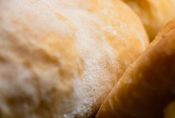 Selective focus close-up of freshly baked yeast, puff dough strudel. Pastries and bakery products
