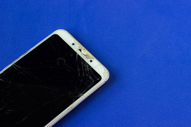 istock Broken glass texture with cracks. Abstract of smartphone broken screen due to shock. 1383568150