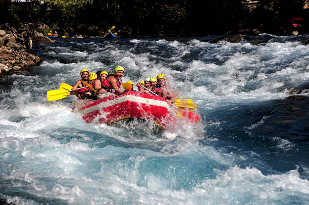 Rafting, Turkey Antalya, Turkey - October 15, 2013: A group of people rafting on the Koprucay in Turkey rafting stock pictures, royalty-free photos & images