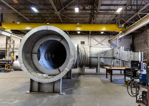 istock Large object in metal fabrication factory 1383599874