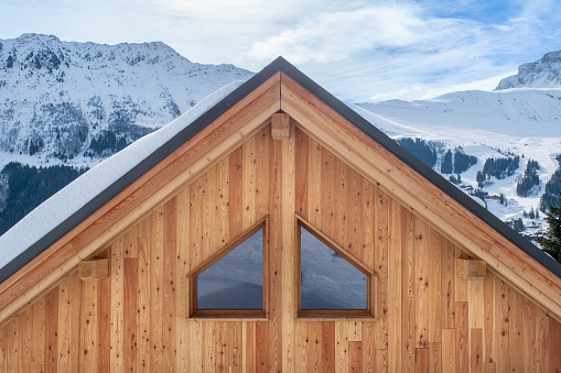Wooden chalet façade in the mountains