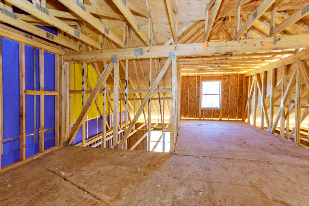 istock Building construction wood framing of a new house under construction 1383623275