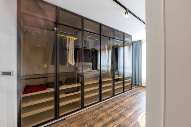 Glass see through closet in modern apartment