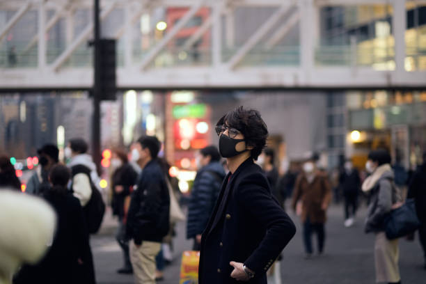 istock A man and Crowd of people 1383635145
