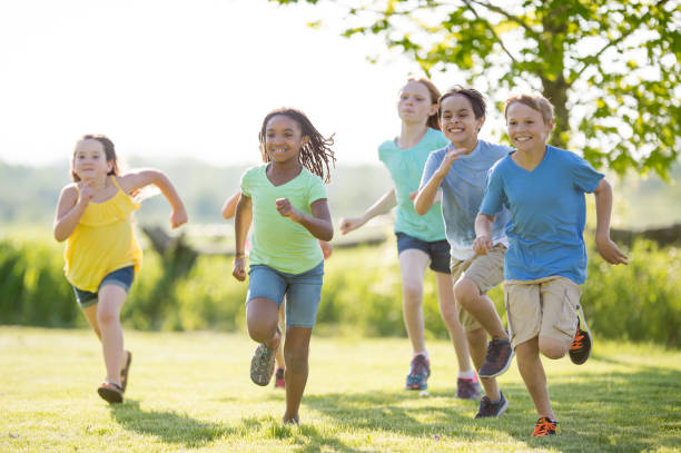 istock Children Running Outside Together 1383637360