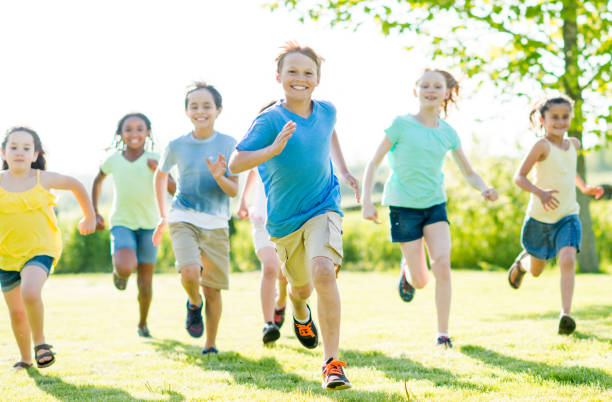 istock Children Running Outside Together 1383637375